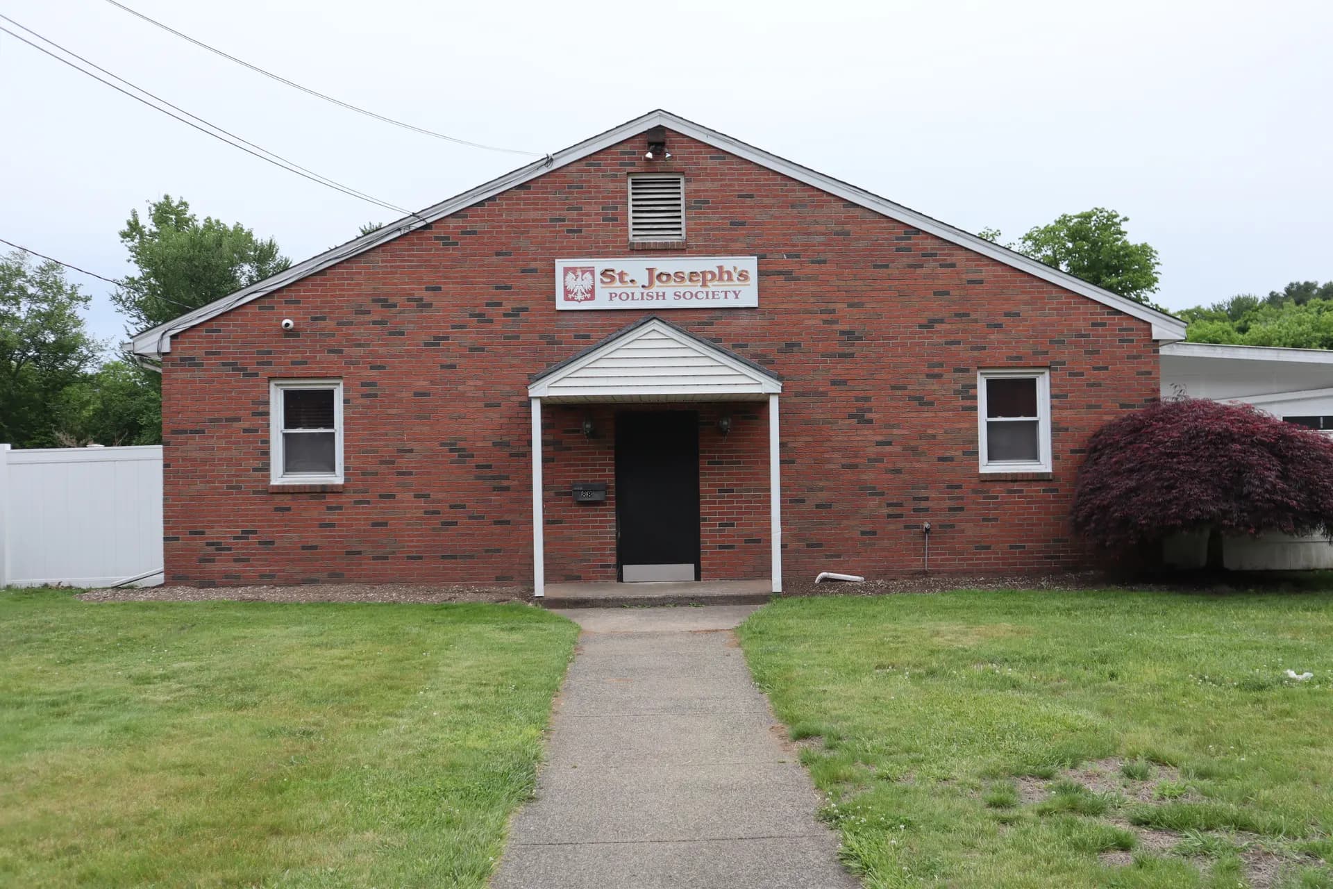 Front of the clubhouse at 88 E Main St