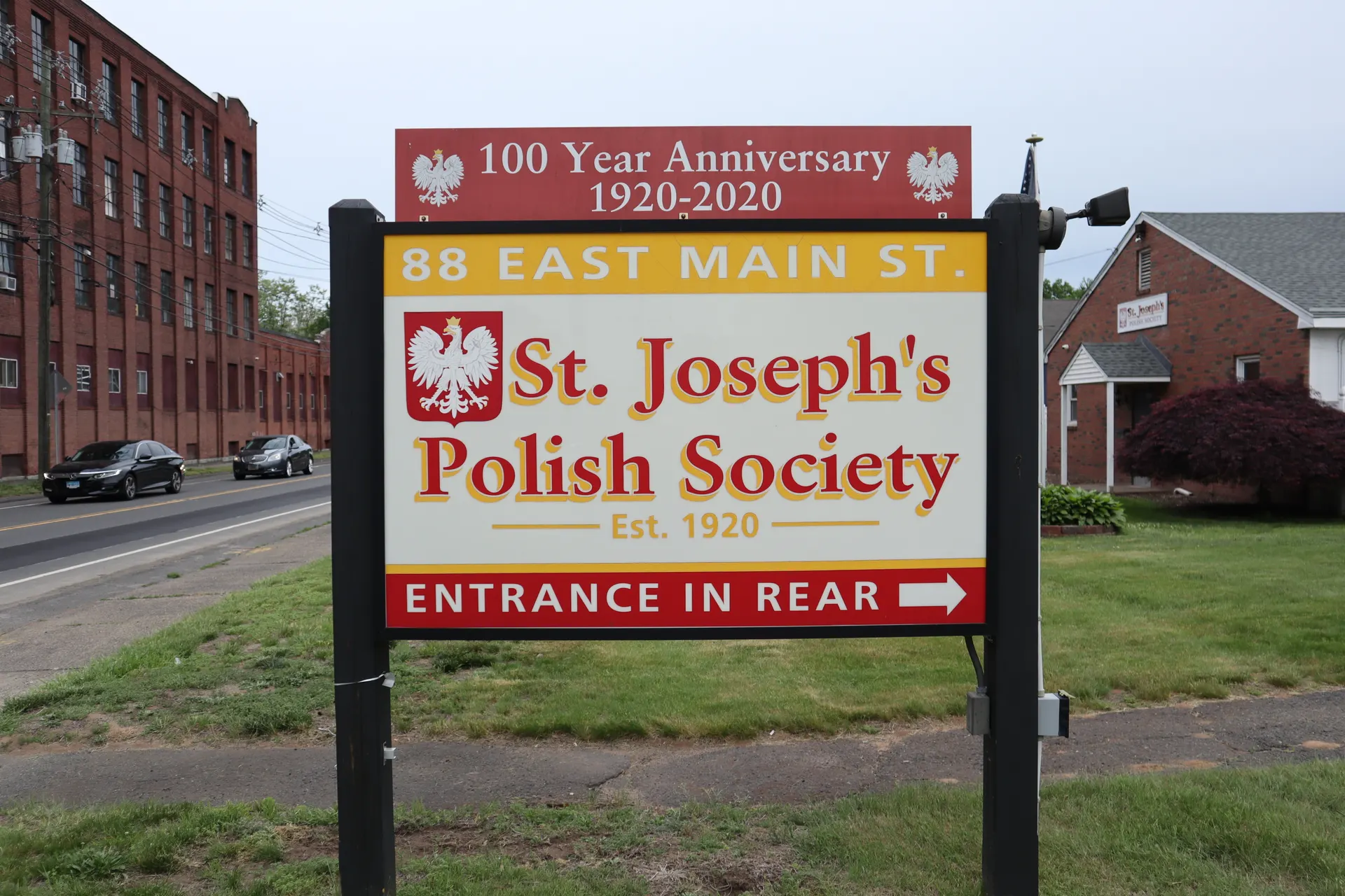 Street sign reading St. Joseph's Polish Society — Est. 1920