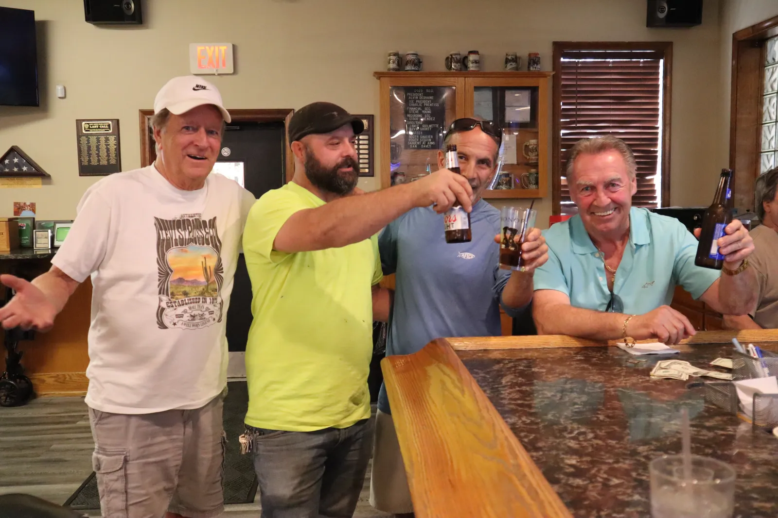 Members gathered for a toast at the club bar inside St. Joseph's Polish Society